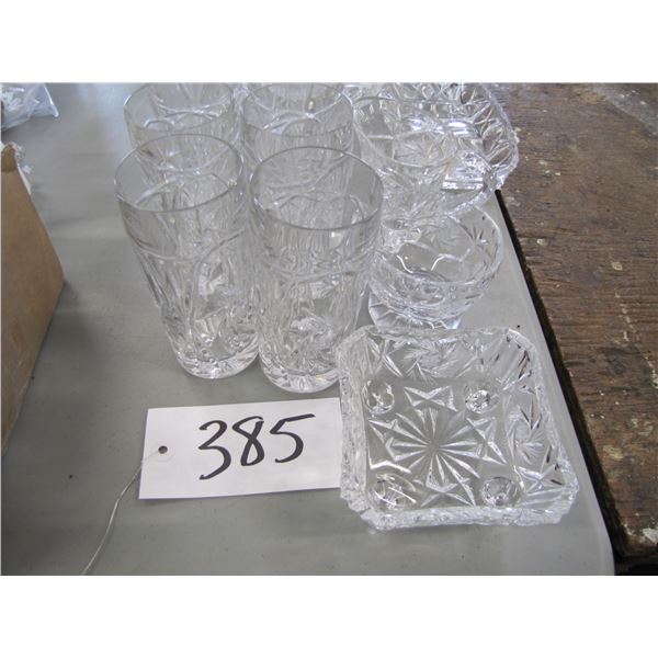 Collection of assorted crystal pieces all have chips or cracks