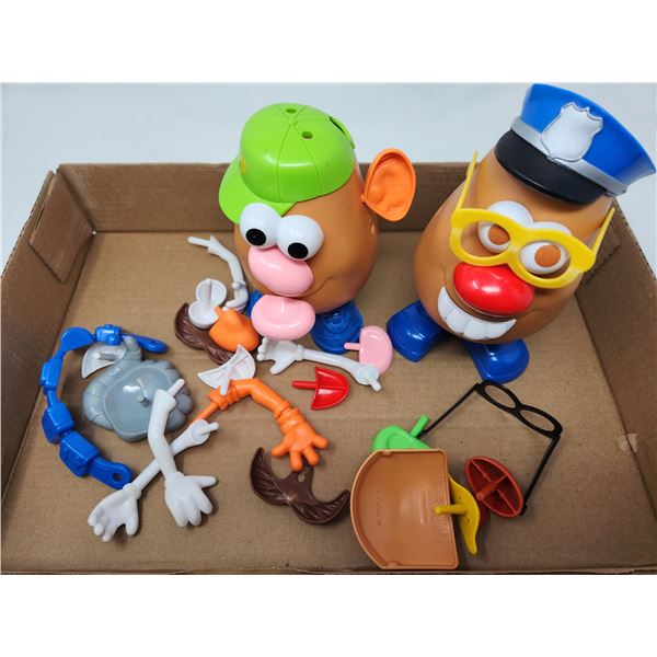 2 Mr. Potato Heads and Pieces