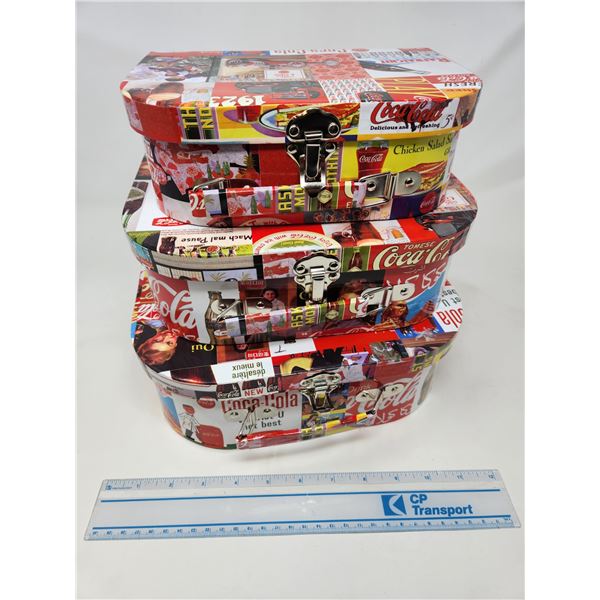 Nestling Coke Boxes