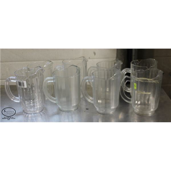 LOT OF 8 ASSORTED POLY CARB PITCHERS APPROX 60 OZ