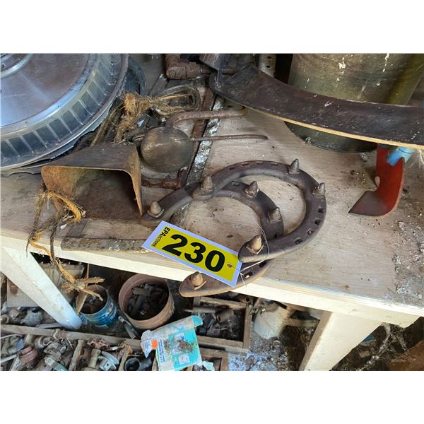 Horse shoes, sythe, bell, hub caps & table