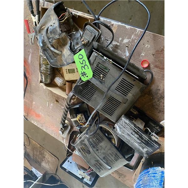 Pile of battery chargers (for repair)