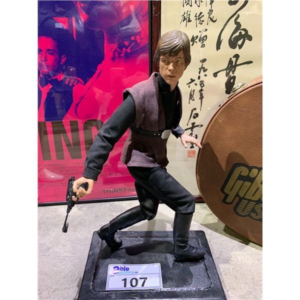 LUKE SKYWALKER WITH PISTOL FIGURE ON CAST IRON BASE APPROX 17  TALL