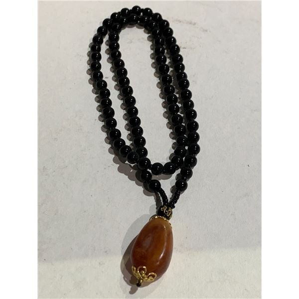 NEPAL BEESWAX PENDANT WITH DARK BEAD NECKLACE