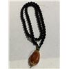 Image 1 : NEPAL BEESWAX PENDANT WITH DARK BEAD NECKLACE