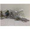 Image 3 : 7 BAGS OF COSTUME JEWELRY