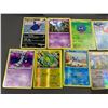 Image 2 : TIN OF ASSORTED POKEMON CARDS