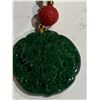 Image 2 : BURMESE SPINACH GREEN 'LOCK OF FORTUNE' JADEITE PENDANT WITH WHITE JADE NECKLACE