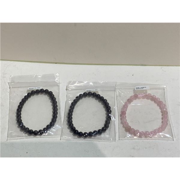 2 SHUNGITE BRACELETS AND 1 ROSE QUARTZ BRACELET