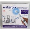 Image 1 : STORE RETURN WATER FLOSSER UNTESTED SOLD AS IS