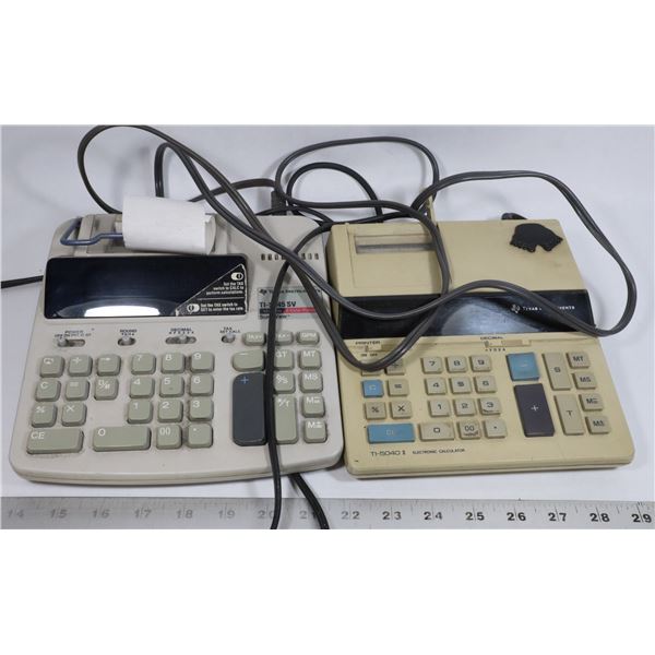 TWO ADDING MACHINES, ONE HAS DAMAGE TO PAPER