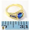 Image 1 : BLUE OVAL 7X9 MM CENTER WITH BLUE AND CLEAR STONES