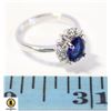 Image 1 : BLUE OVAL SHAPED 6X8 MM WITH CLEAR CZS IN HALO