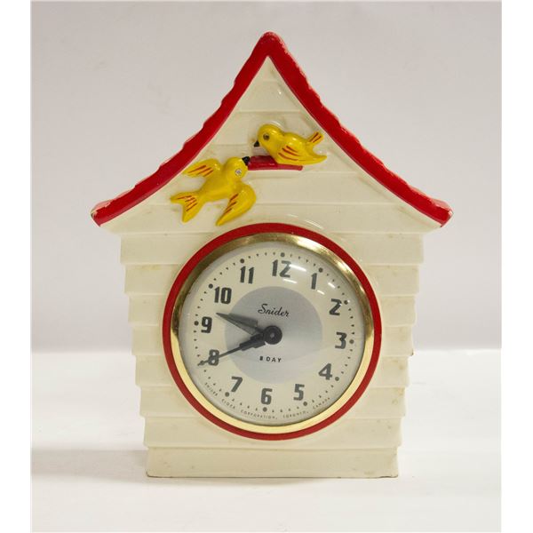 1950'S CERAMIC SNIDER 8 DAY WIND UP WALL