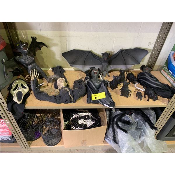 2 SHELVES OF ASSORTED PROPS INCLUDING; BATS, BIRD CAGES, SPIDERS & MORE