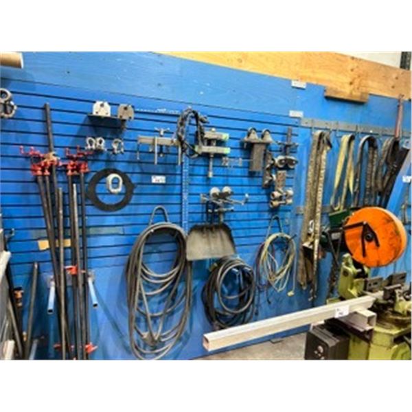 CONTENTS OF RIGGING WALL INCLUDING: EYE HOOKS, LIFTING STRAPS, POLE CLAMPS, SCREW PIN ANCHOR