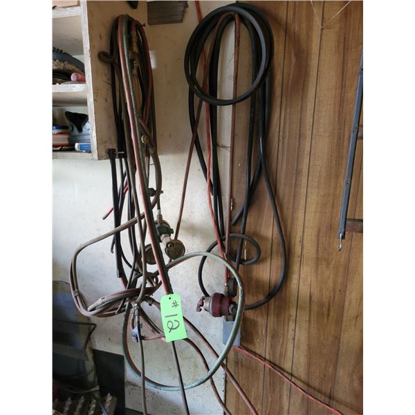 Cutting torch, qty of air hoses, bungee cords etc.