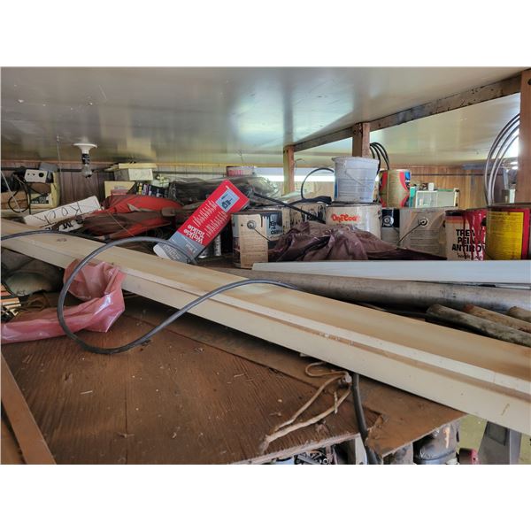 Contents of top rack: Paint, steel, door trim, light fixtures, steel pipe etc.
