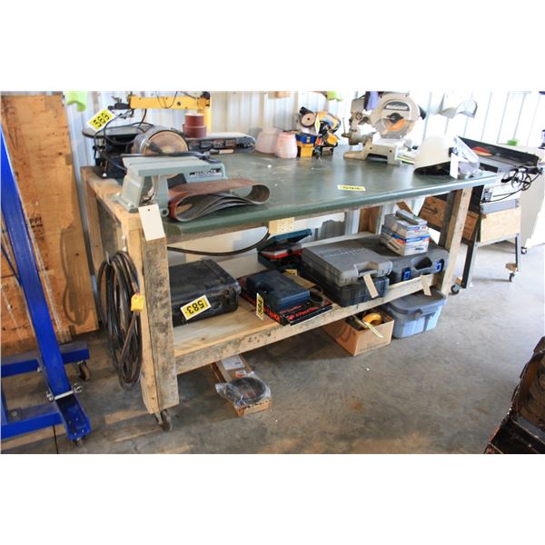workbench with green counter 6 ft on Castor's wired with electric plugs