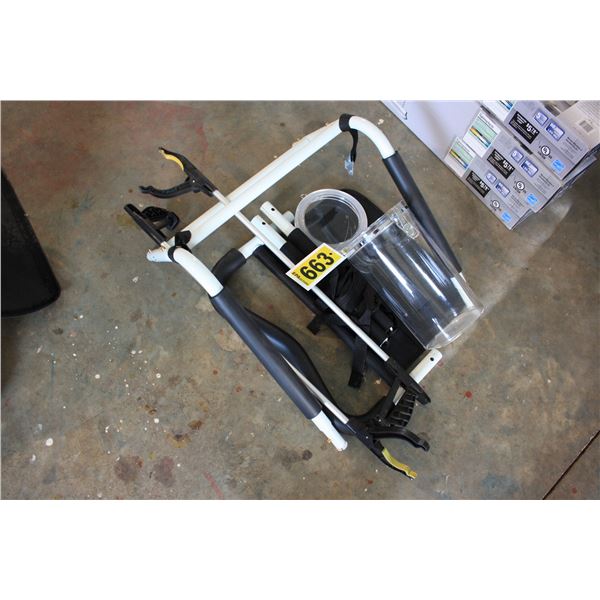 bed rail, 2 reachers, and plastic container