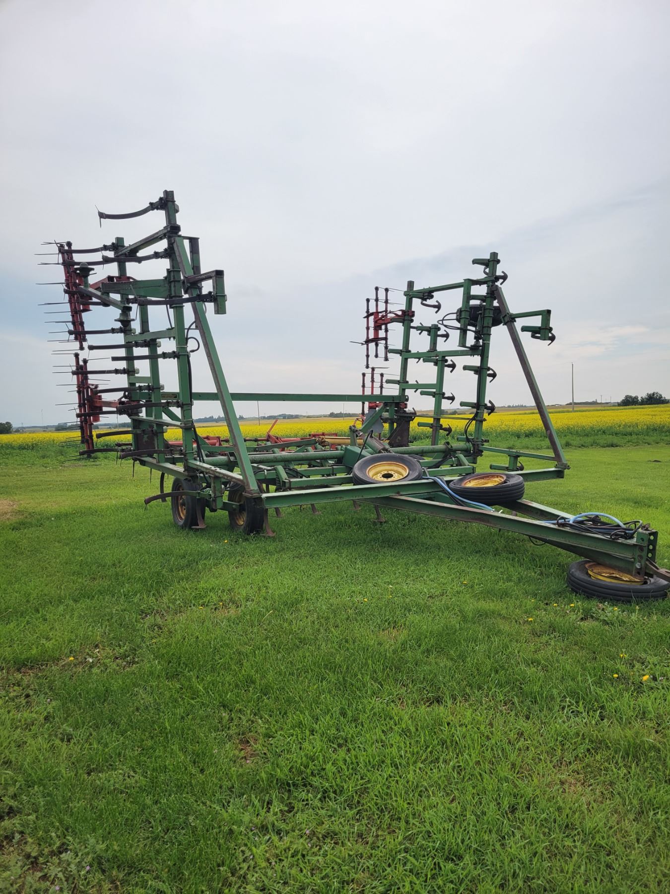 JD 1000 Cultivator, Approx. 30' walking beams c/w 3 bar tines, c/w 3 ...