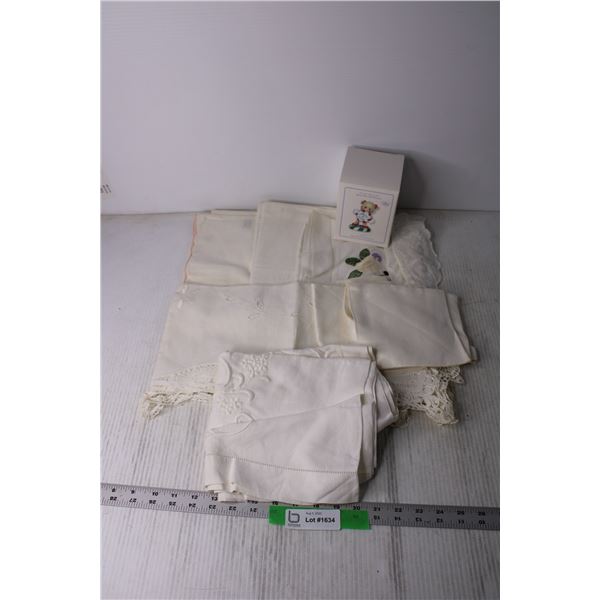 Assorted Linens and Christmas Ornament