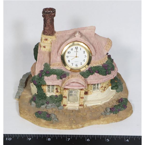 HOUSE STATUE WITH CLOCK IN ATTIC