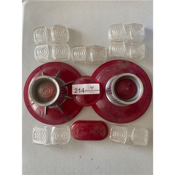 Assortment of different reflectors and light covers  vehicle type unknown