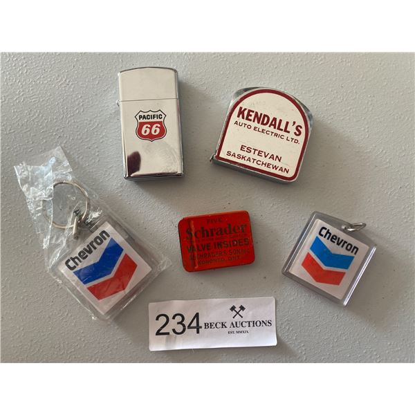 Assortment of Oil & Gas Treasures Keychains, Measuring Tape, Pacific 66 zippo,& fuses