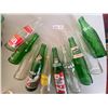 Image 1 : Ten various pop bottles collection  Tab, Mountain Dew, Grape, Diet 7-up, Crush, Schweppes, Teem