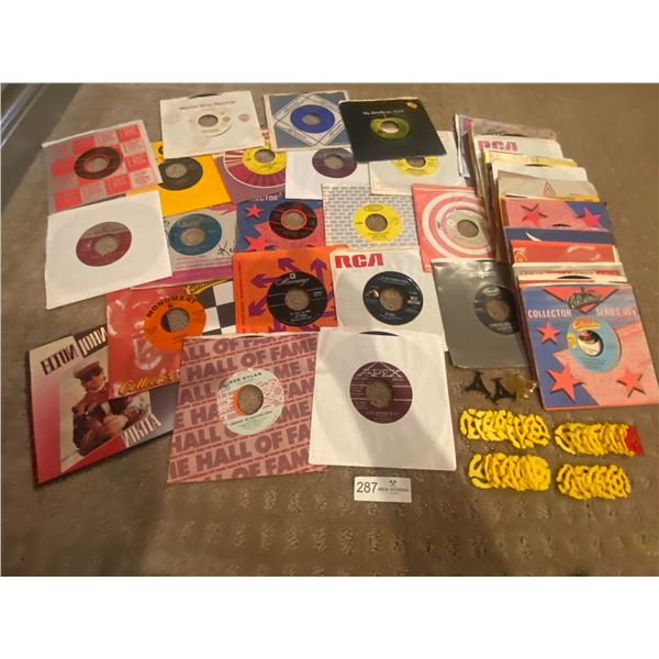 Approximately 45 vintage Rock and Roll Records w/ inserts