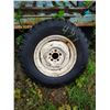 Image 1 : rim and tire - 6.50-16, 5x4.5 bolt pattern *Item located off-site*