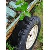 Image 2 : rim and tire - 6.50-16, 5x4.5 bolt pattern *Item located off-site*