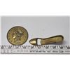 Image 1 : Brass shoe bottle opener and large $20 dollar USA brass coin