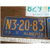 Image 2 : 3 license plates - 2 Alberta and 1 Saskatchewan