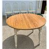 Image 1 : ROUND TABLE WITH TWO LEAVES AND FOUR CHAIRS - WOOD