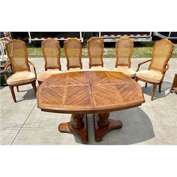 SOLID WOOD TABLE WITH TWO LEAVES AND VINTAGE CANE BACK CHAIRS