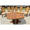 Image 1 : SOLID WOOD TABLE WITH TWO LEAVES AND VINTAGE CANE BACK CHAIRS