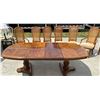 Image 3 : SOLID WOOD TABLE WITH TWO LEAVES AND VINTAGE CANE BACK CHAIRS