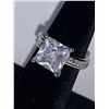 Image 1 : Vera Wang Style Princess Cut 1.1 carat Suspended Solitaire with Bezel Set stones Band