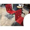 Image 2 : ONE 48"D ROUND TABLE WITH 8 RED STACKING SIDE CHAIRS