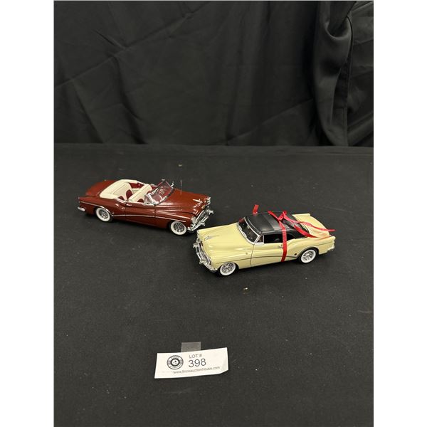 2 diecast cars with original boxes