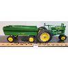 Image 1 : LOT OF 2 - JOHN DEERE DIECAST TRACTOR & PULL BEHIND HAY WAGON