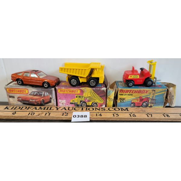 LOT OF 3 - MATCHBOX MODELS - INCL FORK LIFT, DUMP TRUCK & ROVER 3500 W/ BOXES