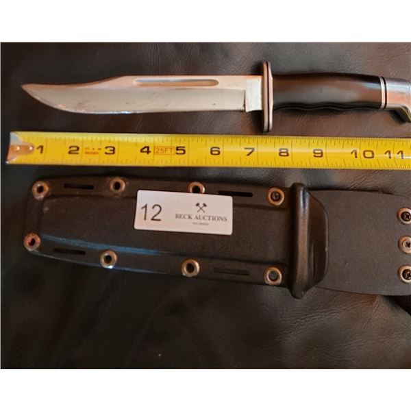 Buck Knife with Plastic Sheath