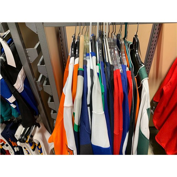 LOT OF ASSORTED HOCKEY JERSEYS IN VARIOUS SIZES & COLOURS