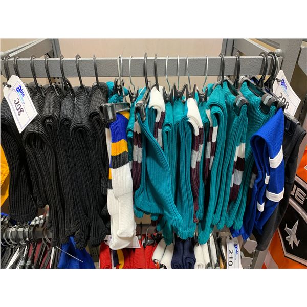 LOT OF ASSORTED HOCKEY LEG WARMERS IN VARIOUS SIZES & COLOURS