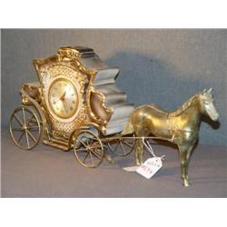 PORCELAIN CLOCK IN HORSE AND CARRIAGE HOLDER