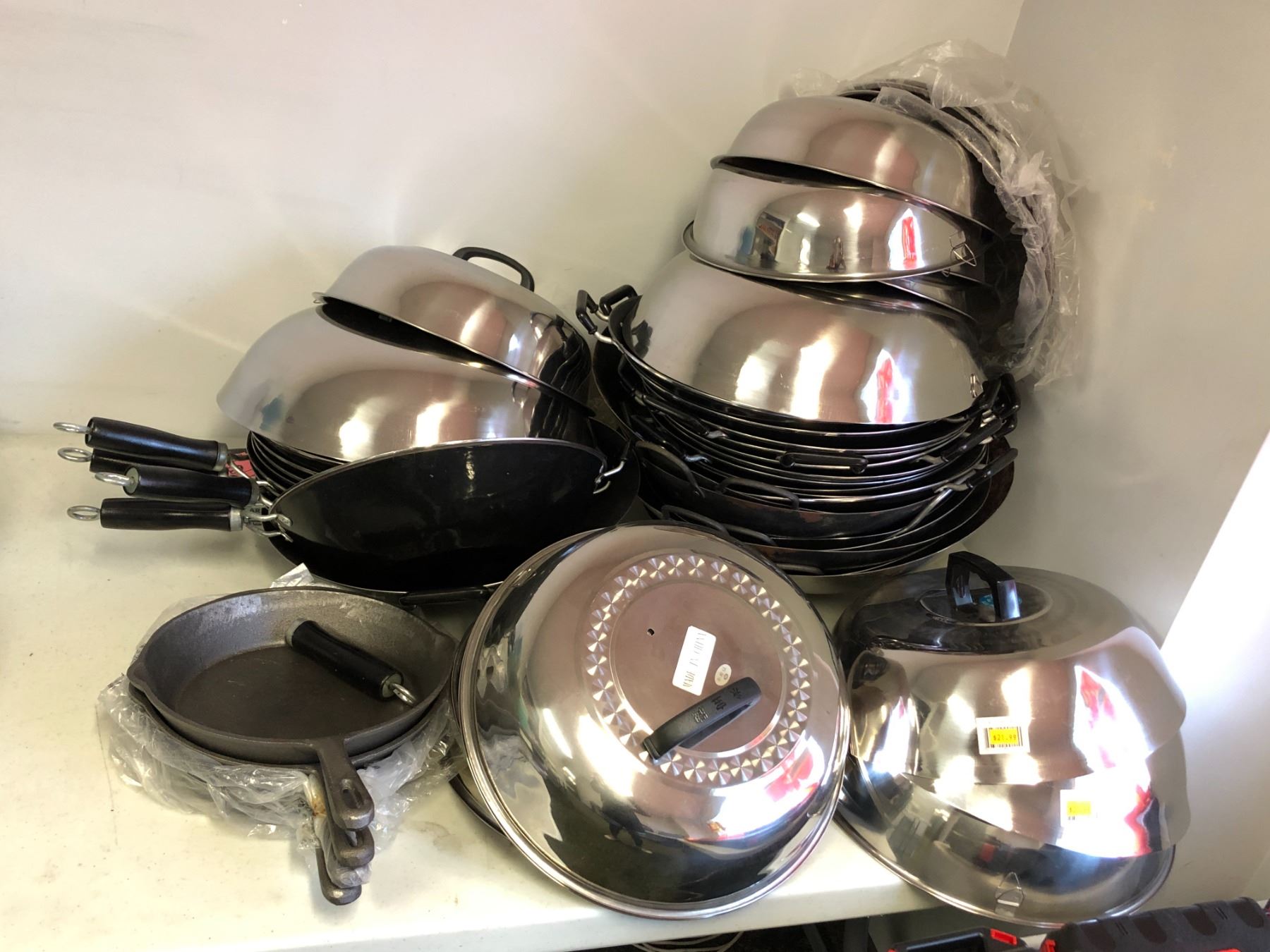 Large group of assorted woks / cooking pans & group of assorted lids ...