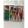Image 1 : Group of 4 vintage Barbie dolls - includes horse lovin Barbie in cowboy outfit / Barbie in city spar